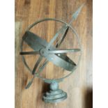 A PATINATED BRONZE SUNDIAL.