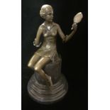 A BRONZE SCULPTURE OF A SEATED FEMALE Holding a vanity mirror, raised on a black marble column. (h