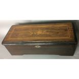 A 19TH CENTURY SWISS ROSEWOOD AND MARQUETRY INLAID COMB AND CYLINDER RECTANGULAR MUSIC BOX Inlaid