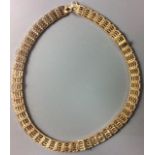 A VINTAGE 9CT GOLD GATE NECKLACE Having a link of five bar segments engraved with diagonal lines,