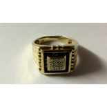 A 9CT GOLD, SAPPHIRE AND DIAMOND SET SIGNET RING The square bezel with a central square pavé set,