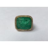 HIRSH, A HALLMARKED 18CT GOLD, CARVED EMERALD AND DIAMOND COCKTAIL RING Large rectangular cabochon