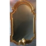 MANNER OF WILLIAM KENT, A LARGE 19TH CENTURY GILTWOOD AND GESSO MIRROR The plated glass housed in