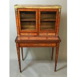 A 19TH CENTURY FRENCH KINGWOOD BONHEUR DU JOUR The superstructure comprising of galleried top,