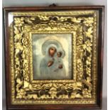 A LARGE 19TH CENTURY RUSSIAN ICON OIL ON PANEL Madonna and child, with Russian hallmarked silver