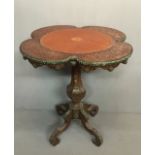 A LATE 19TH/EARLY 20TH CENTURY CHIP VENEERED MAHOGANY OCCASIONAL TABLE The clover leaf top set