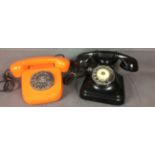 TWO VINTAGE BAKELITE TELEPHONES To include a black phone with rotations, finger dial and lobster