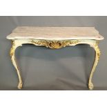 A 19TH CENTURY FRENCH CONSOLE TABLE With marble top above a cream painted and parcel gilt base, with