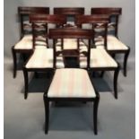 A SET OF SIX 19TH CENTURY MAHOGANY BAR BACK CHAIRS With carved rail over stripe upholstered drop