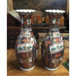 A PAIR OF ORIENTAL VASES with chinoiserie decorated bodies and panels painted with garden scenes a/f