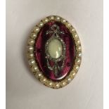 AN EARLY 19TH CENTURY GOLD, ENAMEL, PEARL AND DIAMOND SET BROOCH Elliptical pink guilloché enamel