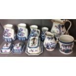 A GRADUATING SET OF FOUR EARLY 20TH CENTURY LOSAL POTTERY JUGS Decorated in the Shanghai pattern,