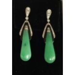 A PAIR OF ART DECO STYLE 18CT WHITE GOLD AND JADEITE DROP EARRINGS The long pear shaped jadeite