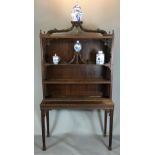 A LATE 19TH/EARLY 20TH CENTURY CHINESE CHIPPENDALE MAHOGANY DISPLAY CABINET ON STAND Carved and