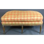 A LARGE 18TH CENTURY FRENCH UPHOLSTERED STOOL Raised on six fluted legs. (h 48cm x d 69cm x w