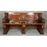 A MAHOGANY THREE SEAT HALL BENCH OF CLASSICAL DESIGN With acanthus carved arms and ogee fielded