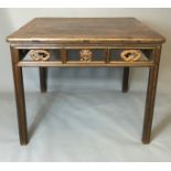 A 17TH/18TH CENTURY CHINESE HARDWOOD WINE TABLE Having a panelled top over carved frieze decoration,