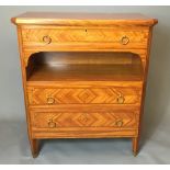 AN EARLY 20TH CENTURY SATINWOOD AND CROSSBANDED CHEST OF THREE LONG DRAWERS With canted corners