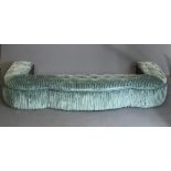 A LARGE SERPENTINE FORM HEARTH SEAT Upholstered in turquoise cut velvet. (220cm x 94cm x 36cm)