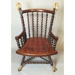 A MID 19TH CENTURY AMERICAN MAHOGANY OPEN ARMCHAIR With gilt metal finials in the form of swan heads