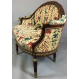 A 19TH CENTURY FRENCH EMPIRE GILT BRONZE AND ORMOLU MOUNTED MAHOGANY TWO SEATER UPHOLSTERED SETTEE