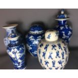 AN ORIENTAL BLUE & WHITE POTTERY GINGER JAR hand painted with the 'thousand boys' pattern,bearing