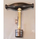 AN ANTIQUE MEDICAL BORING TOOL With ebony handle a steel and brass shaft. (11cm)