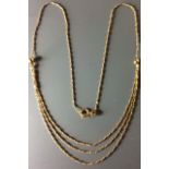 A VINTAGE 9CT GOLD THREE STRAND NECKLACE Rope twist design with two spherical mounts Approx 21.5cm