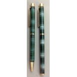 SHEAFFER, TARGA, A VINTAGE GOLD PLATED AND GREEN LACQUER FOUNTAIN AND BALL PEN SET Hooped design