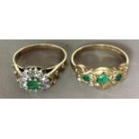 TWO VINTAGE 9CT GOLD, EMERALD AND DIAMOND RINGS The round cut emerald surrounded by single a row