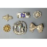 A COLLECTION OF VINTAGE CONTINENTAL SILVER BROOCHES A large pierced brooch of a Viking snipe at full