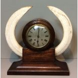 A LATE 19TH/EARLY 20TH CENTURY HIPPOPOTAMUS TUSK MANTLE CLOCK