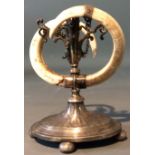 A LATE 19TH CENTURY SILVER PLATED CANDLESTICK WITH WILD BOAR TUSKS