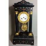 LEROY, PARIS, A 19TH CENTURY EBONIZED WOOD AND BRASS PORTICO CLOCK Of architectural style, with