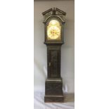 ATTRIBUTED TO WILLIAM SELWOOD, A 19TH CENTURY LONGCASE CLOCK The face with gilt metal mounts