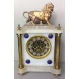 A 19TH CENTURY MARBLE AND SPELTER ORMOLU FIGURAL MANTLE CLOCK Mounted with a lion finial and