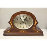 AN EARLY 20TH CENTURY MANTLE CLOCK The silvered dial with Arabic numeral chapter ring and chiming