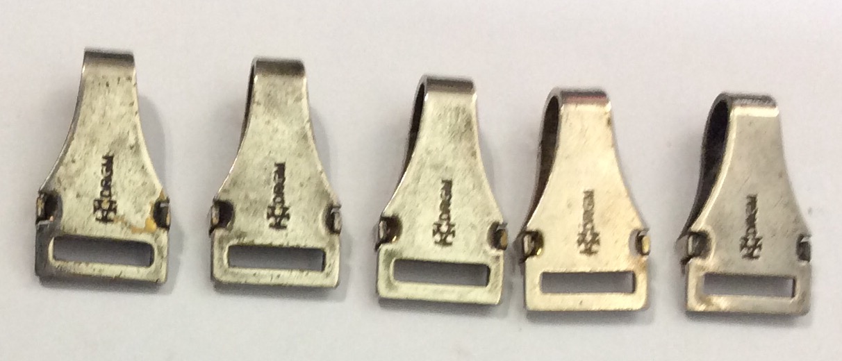 A COLLECTION OF FIVE GERMAN DAGGER HANGER NICKEL CLIPS Each marked 'ASSMANN DRGM'. - Image 2 of 2