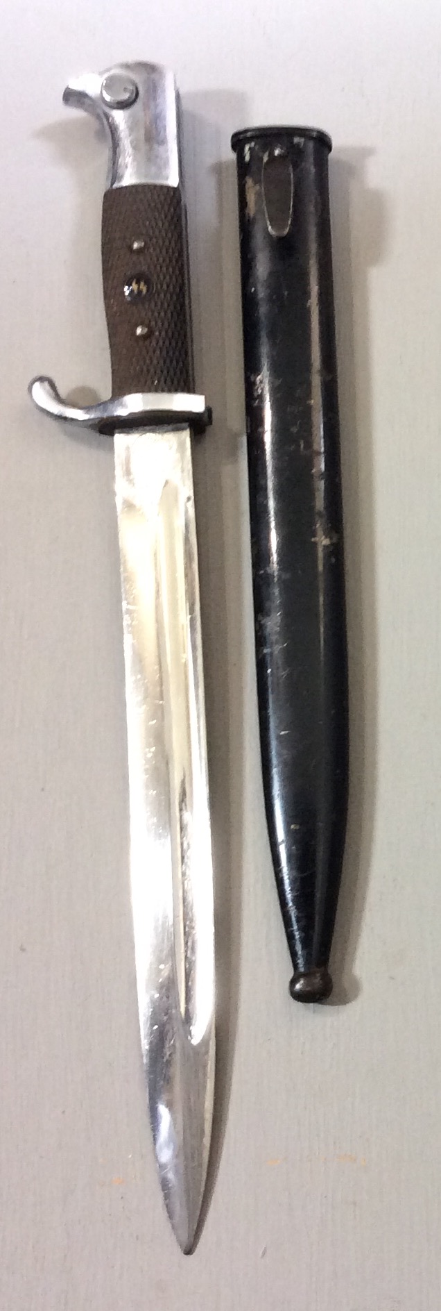 A WORLD WAR II GERMAN SS DRESS BAYONET The handle fitted with a period roundel badge and black - Image 3 of 6