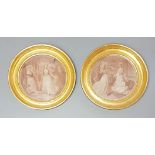 A PAIR OF 18TH CENTURY CIRCULAR SEPIA ENGRAVINGS Ladies' in pastoral settings, gilt framed and