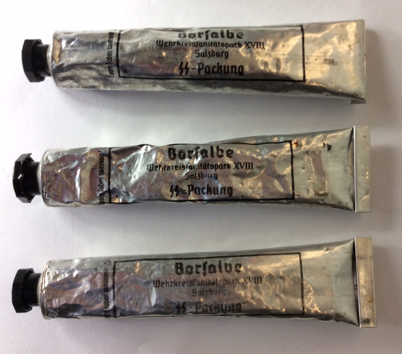 A COLLECTION OF THREE WORLD WAR II GERMAN SS ANTISEPTIC CREAM TUBES Silver aluminium, marked ' - Image 2 of 2