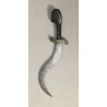 AN 18TH/19TH CENTURY (POSSIBLY PERSIAN) HORN HILT DAGGER With engraved curved blade. (l 33.5cm)