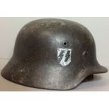 A WORLD WAR II GERMAN DOUBLE DECAL HELMET OF NEDERLAND DIVISION WAFFEN SS Having German SS and Dutch