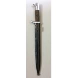 A WORLD WAR II GERMAN SS DRESS BAYONET The handle fitted with a period roundel badge and black