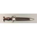 A WORLD WAR II GERMAN SA DAGGER Brown wooden grip with solid nickel fittings and brown leather