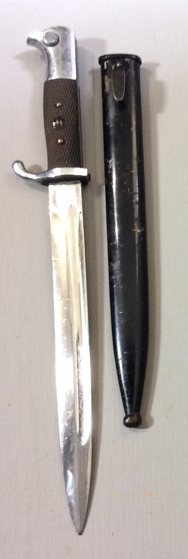 A WORLD WAR II GERMAN SS DRESS BAYONET The handle fitted with a period roundel badge and black - Image 4 of 6
