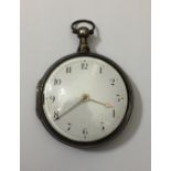 A GEORGE III SILVER PAIR CASED POCKET WATCH Having a white enamelled dial with Arabic numerals and