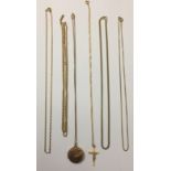 A COLLECTION OF 9CT GOLD AND YELLOW METAL CHAINS AND PENDANTS To include a 9ct gold crucifix,