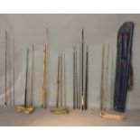 A COLLECTION OF SEVEN SPLIT CANE AND SEA FISHING RODS To include three fly fishing rods contained in