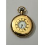 AN EARLY 20TH CENTURY 18CT GOLD HALF HUNTER POCKET WATCH The white enamelled face with Roman numeral